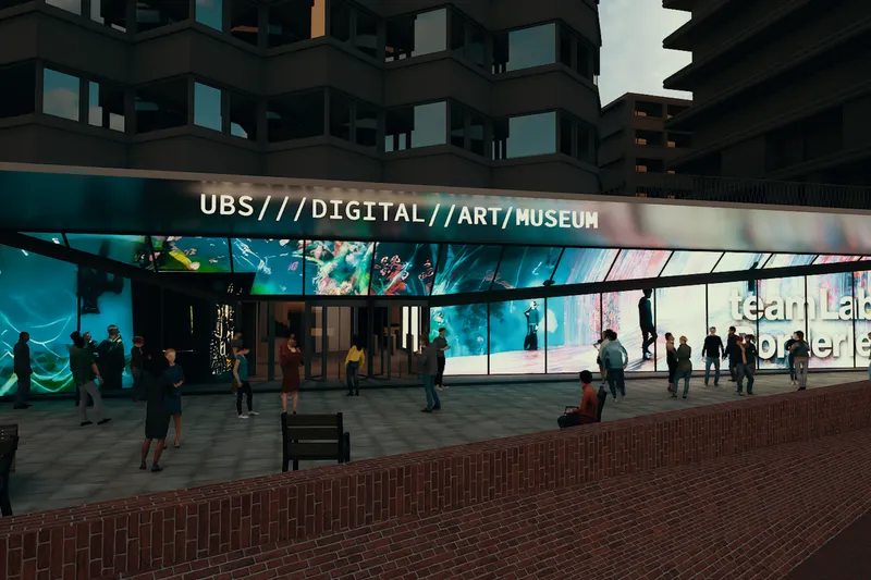 Exterior view of the UBS Digital Art Museum with people gathered in front, featuring a digital art display and signage for 'teamLab Borderless'.